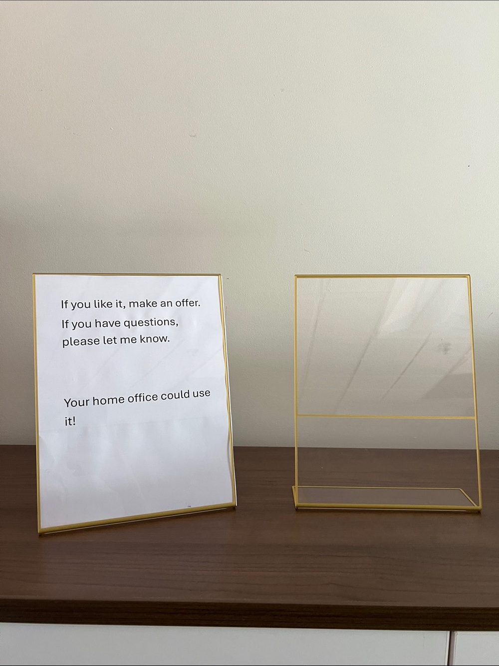 Two plastic paper holders